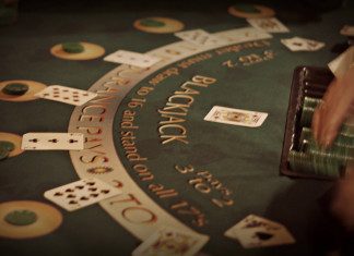 Understanding Blackjack Odds And Basic Winning Strategy blackjack-table