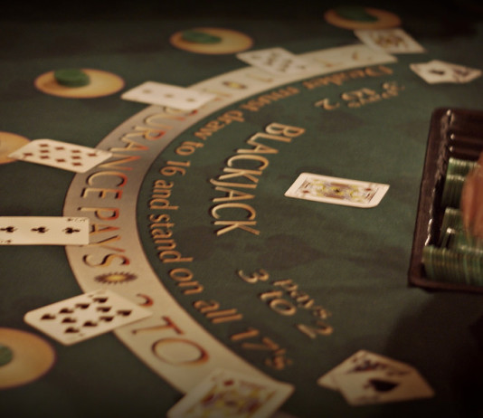 Understanding Blackjack Odds And Basic Winning Strategy blackjack-table